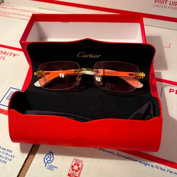 cartier sunglasses red lens
